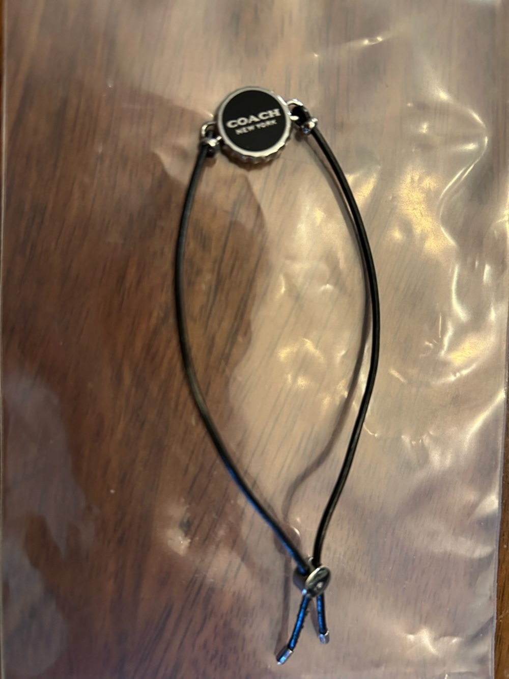 Coach Enamel Bottle Cap Black Leather Adjustable Bracelet - Picture 5 of 5